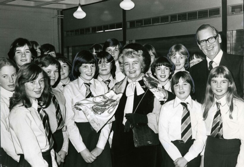 Lord and Lady Thomson of Monifieth with children of Monifieth High School. Image: DC Thomson.