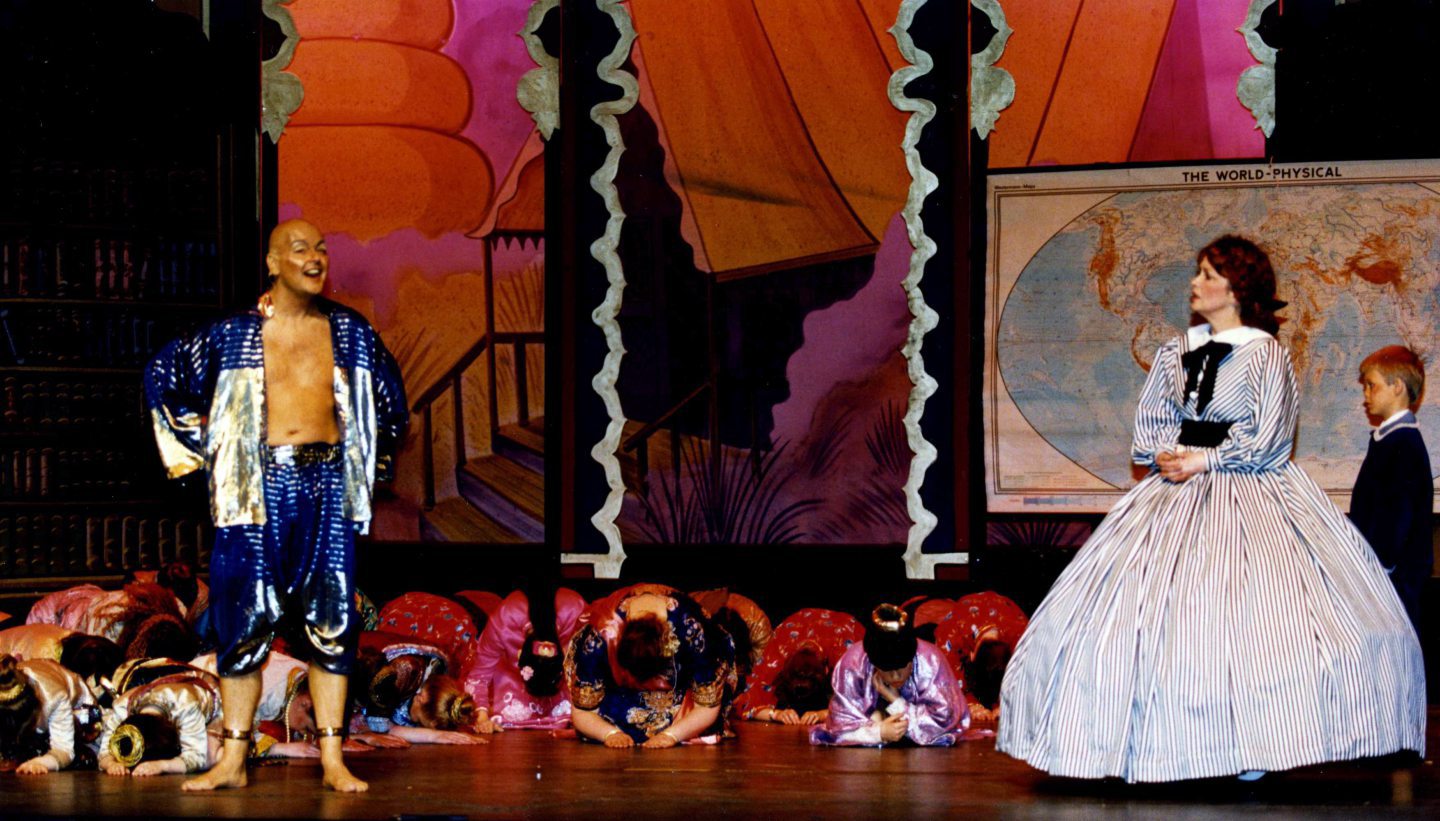 A stage scene of the King and I with Brian and Agnes.