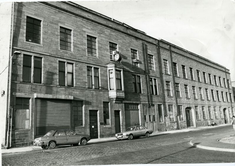 Exterior of Caird Carpets Ltd, Ashton Works, Hawkhill, Dundee, when it closed down in 1982.