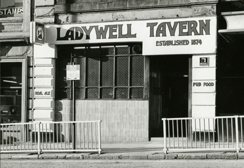 A black and white shot of the outside of Ladywell Tavern.