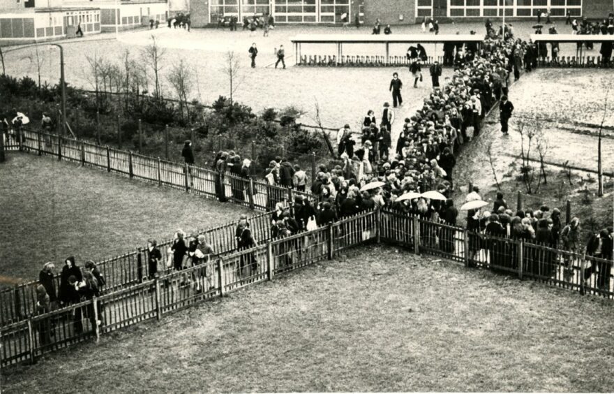 Pupils using the path which leads on to Tweed Crescent. Image: DC Thomson.