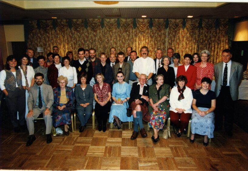 Some of the former pupils who attended Menzieshill High School's 25th anniversary got together in the Queen's Hotel in September 1996.