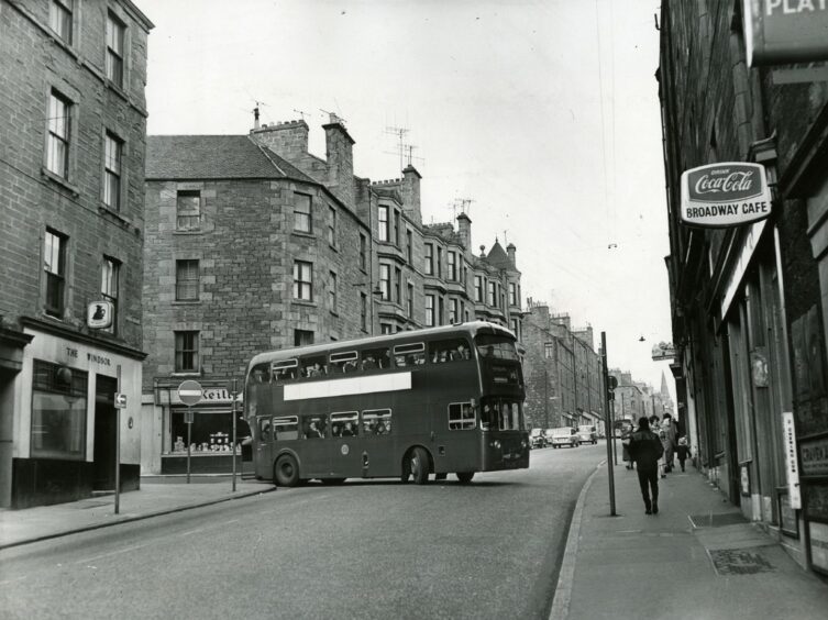 The Broadway Café is under tenement in this image from 1965. Image: DC Thomson.