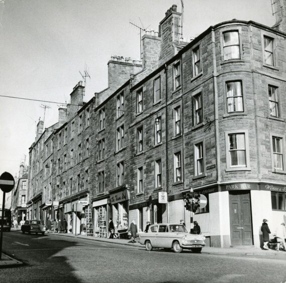 A row of tenement housing with shops on the ground floor in Albert Street in 1968. Image: DC Thomson.