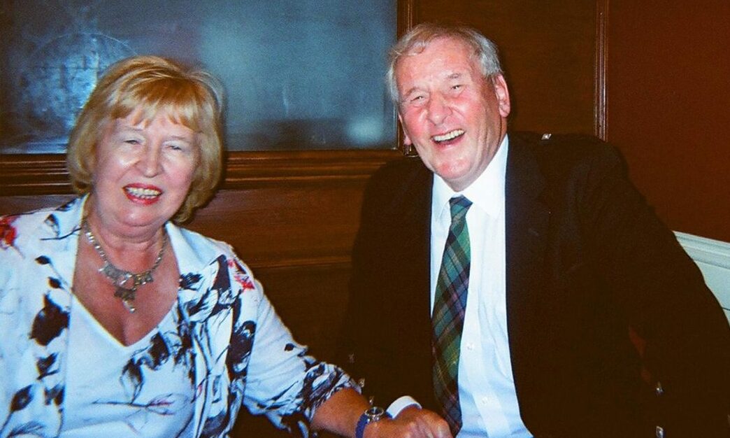 The photograph shows Mr and Mrs Watson at a social event.