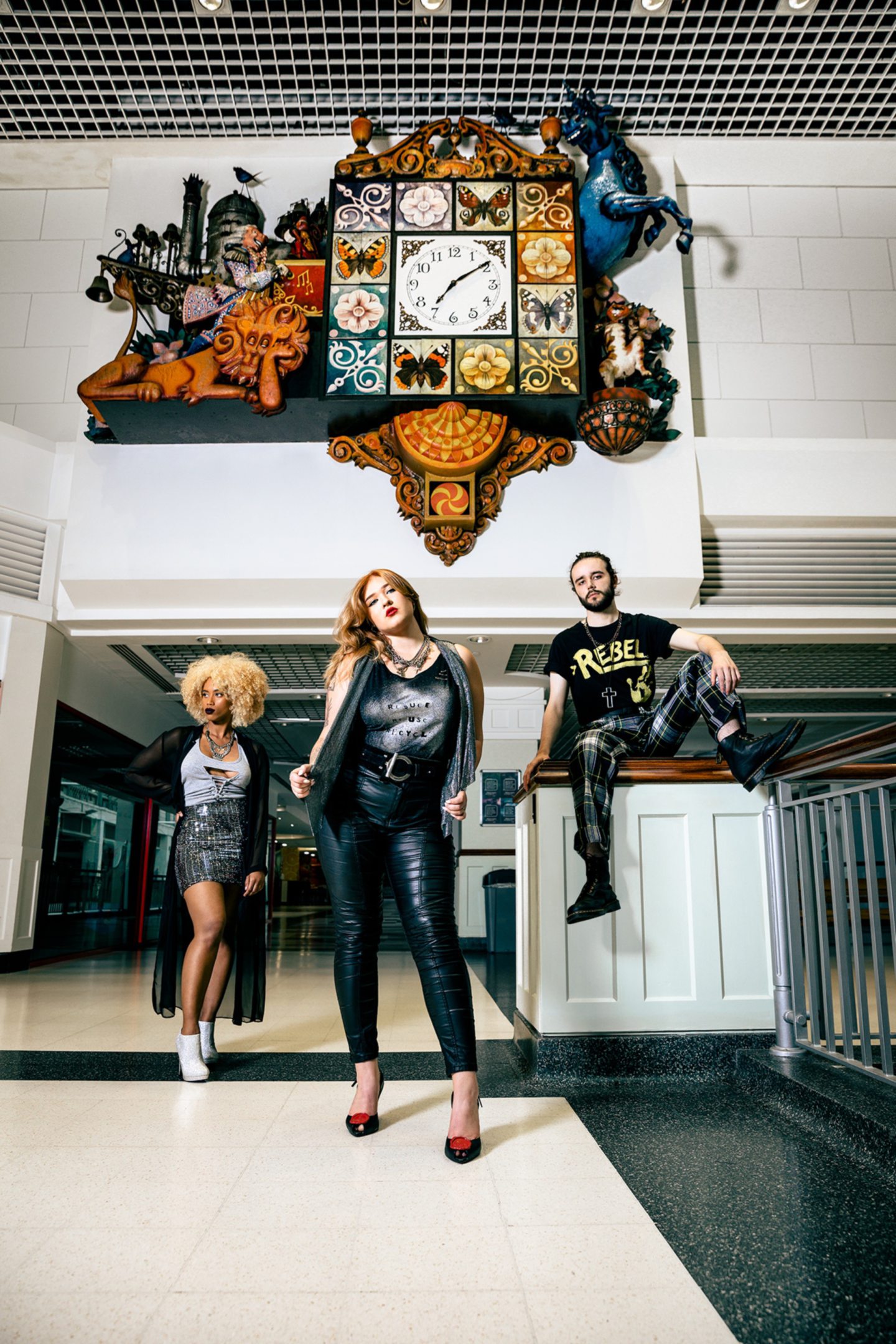 Models pose under the Wellgate Clock.