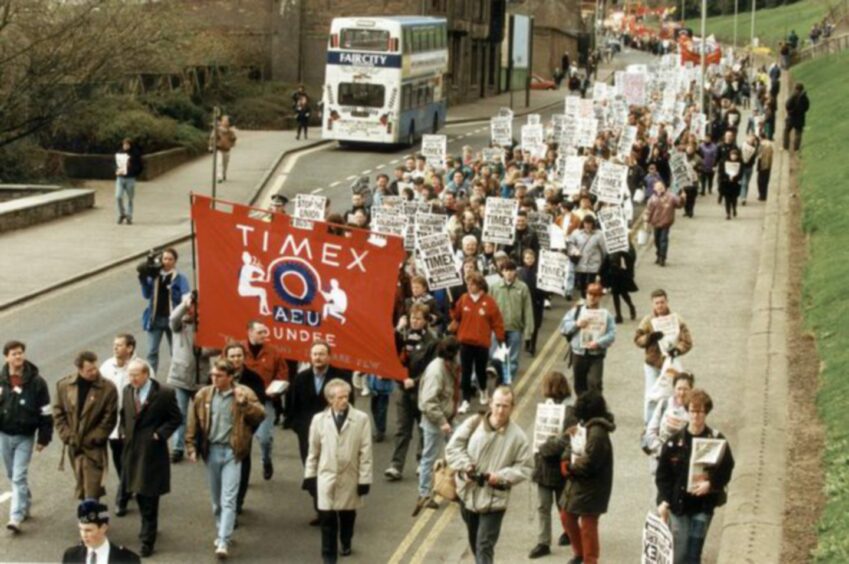 A protest march by Timex workers