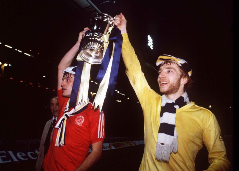 Glenn Hoddle and Steve Archibald celebrate the FA Cup final win at Wembley in 1982. Image: Shutterstock.