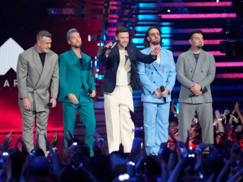 Joey Fatone, from left, Lance Bass, Justin Timberlake, JC Chasez and Chris Kirkpatrick of NSYNC present the award for best pop during the MTV Video Music Awards (Charles Sykes/Invision/AP)
