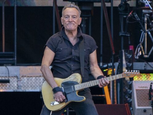 Bruce Springsteen, with The E Street Band, on stage at Murrayfield, Edinburgh, during his 2023 tour (PA)
