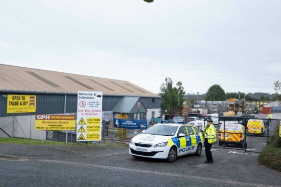 Police at the GPH Builders Merchants yard in Stonehaven after the disturbance on Tuesday.