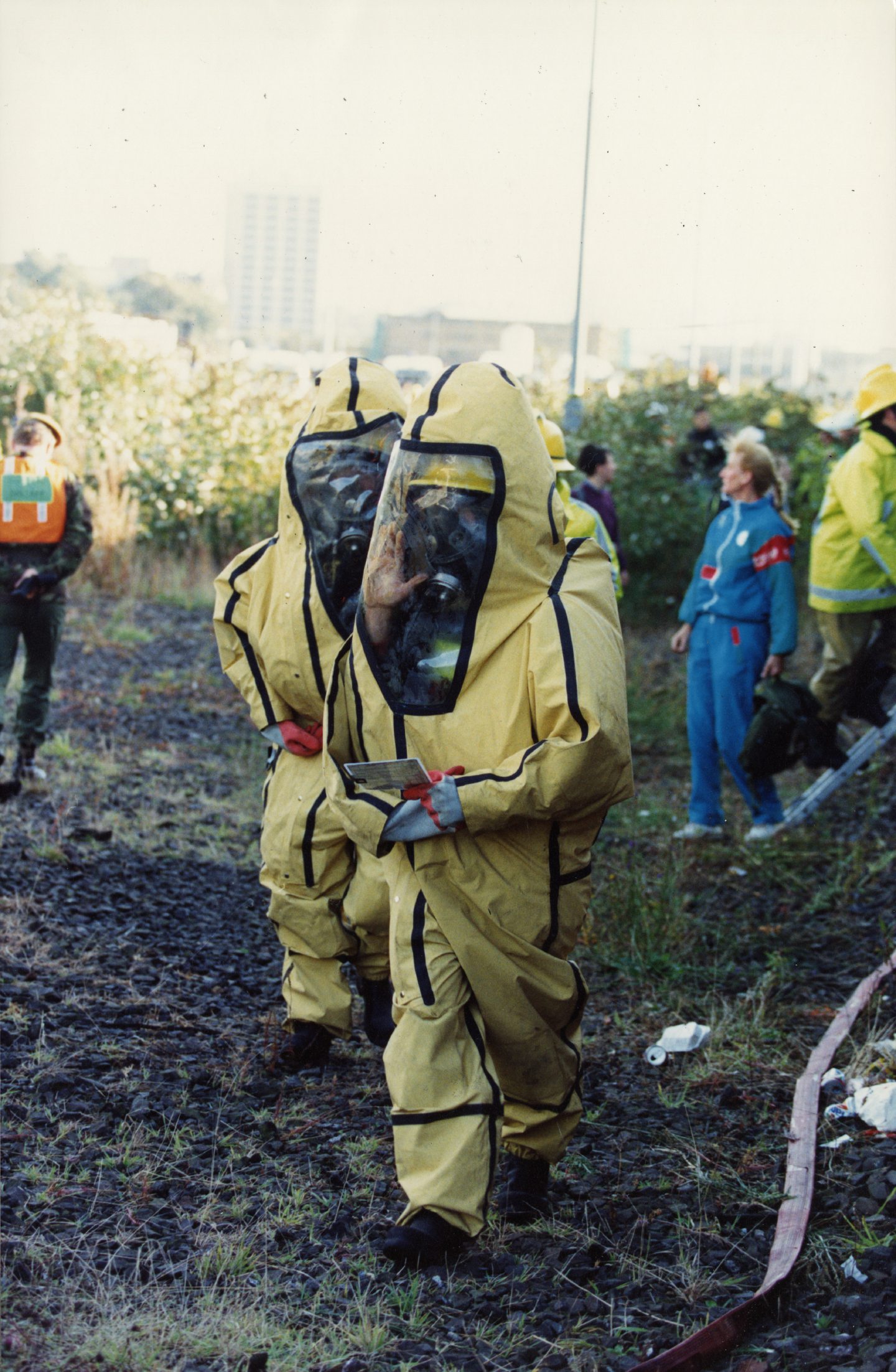 Emergency workers in protective clothing at the scene in September 1991. Image: DC Thomson.