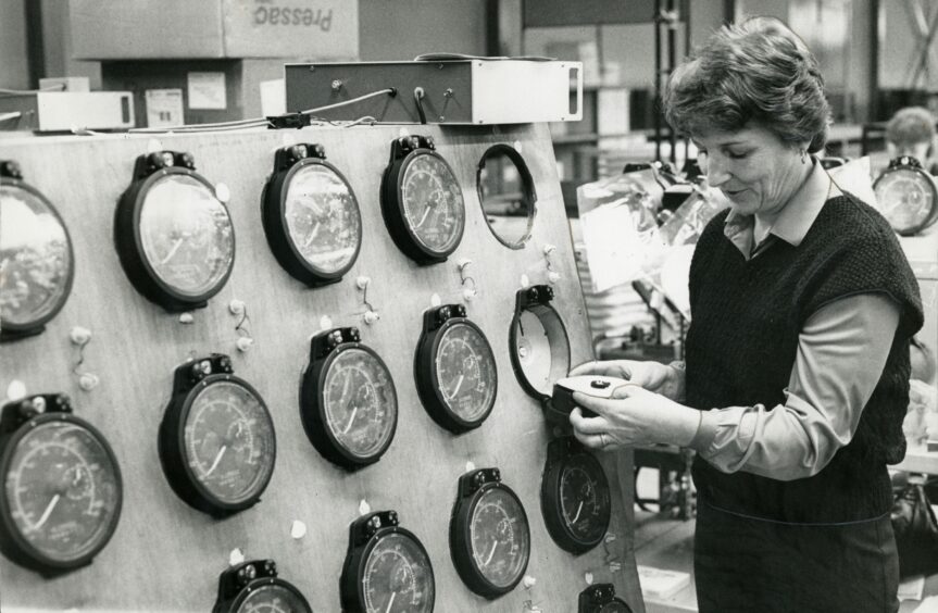 Sheila Lorimer testing tachographs at Veeder-Root in 1983. Image: DC Thomson.