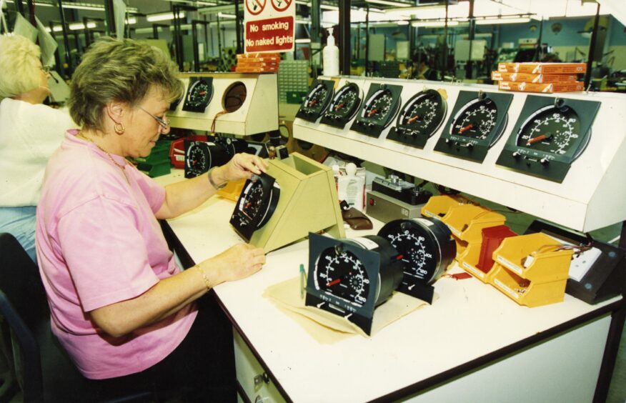 Two staff members working on tachographs at Veeder-Root in 1991. Image: DC Thomson.