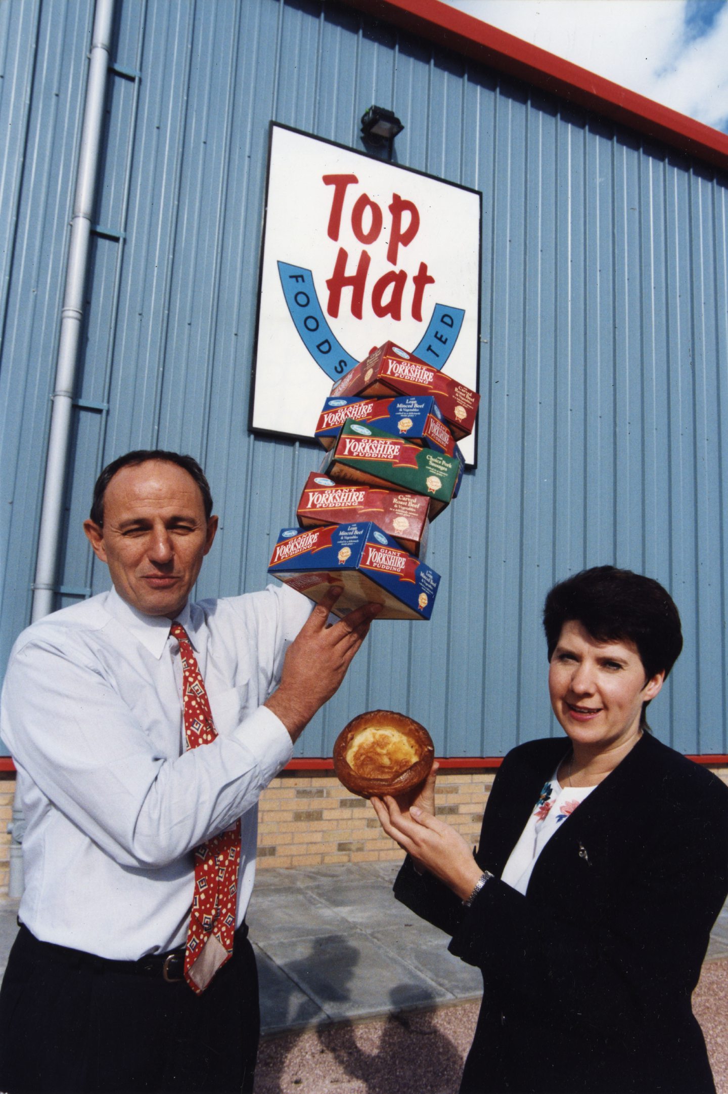 Top Hat Foods Ltd director John Whitehead was celebrating in 1995 with Tesco's Scottish marketing manager Isa Kinnear.