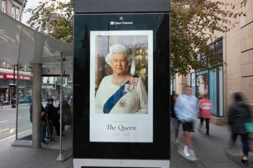 Advertising boards paid tribute to the Queen in Dundee city centre. Image: DC Thomson.