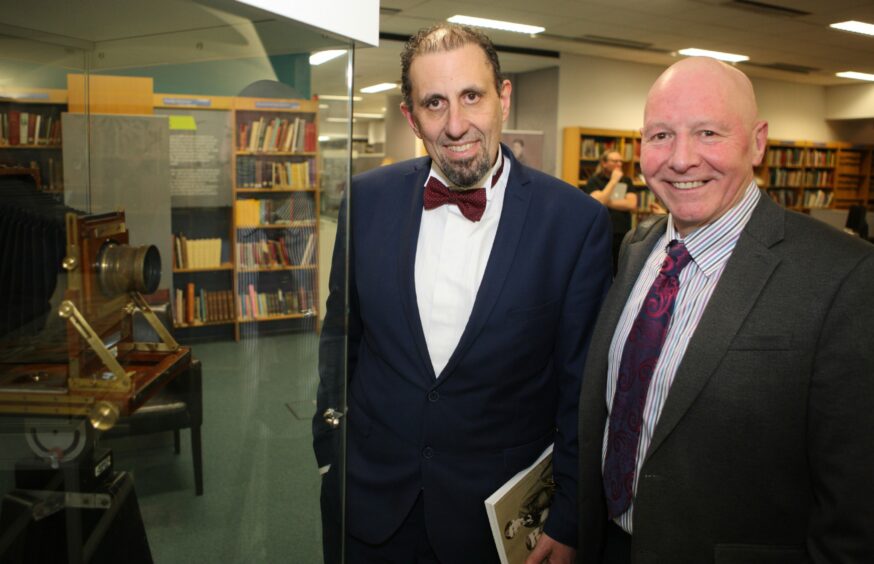 Our classic pub guides - Dr Paul Philippou, left, and Roben Antoniewicz at Perth Library. Image: Phil Hannah.