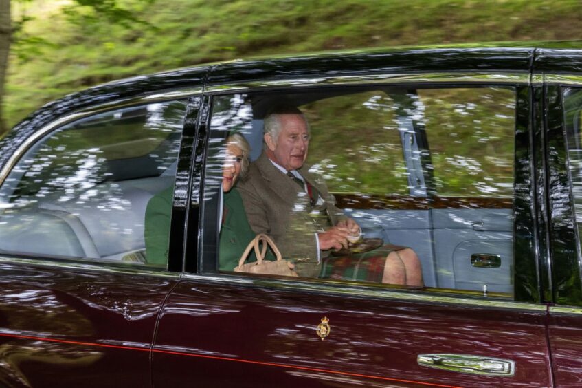 King Charles III and Queen Camilla arrive at Crathie Kirk, near Balmoral, for a Sunday church service. Image: PA