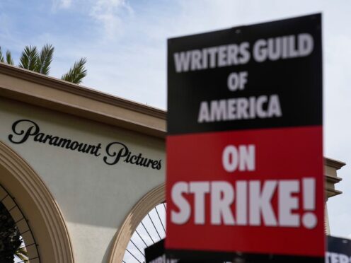 Members of the The Writers Guild of America picket outside Paramount Pictures (Ashley Landis/AP)