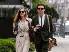 Danny Masterson, right, and his wife Bijou Phillips at a Los Angeles court in May (Chris Pizzello/AP)