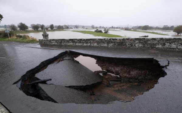 The River South Esk is visible through the gaping hole in the bridge. Image: Paul Reid.