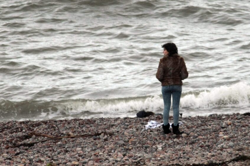 Scarlett Johansson on the beach at Auchmithie in 2011. Image: Kim Cessford/DC Thomson.