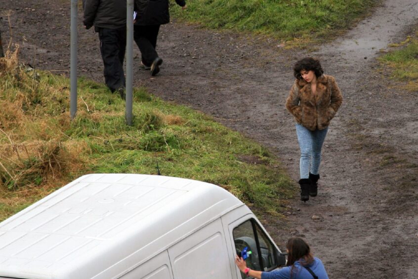 Actress Scarlett Johansson made frequent trips to a white van for warmth during breaks in filming. Image: Kim Cessford/DC Thomson.