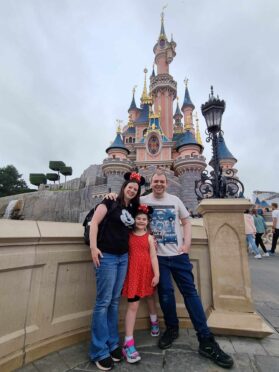 Dave, Jonelle and Olivia at Disneyland Paris