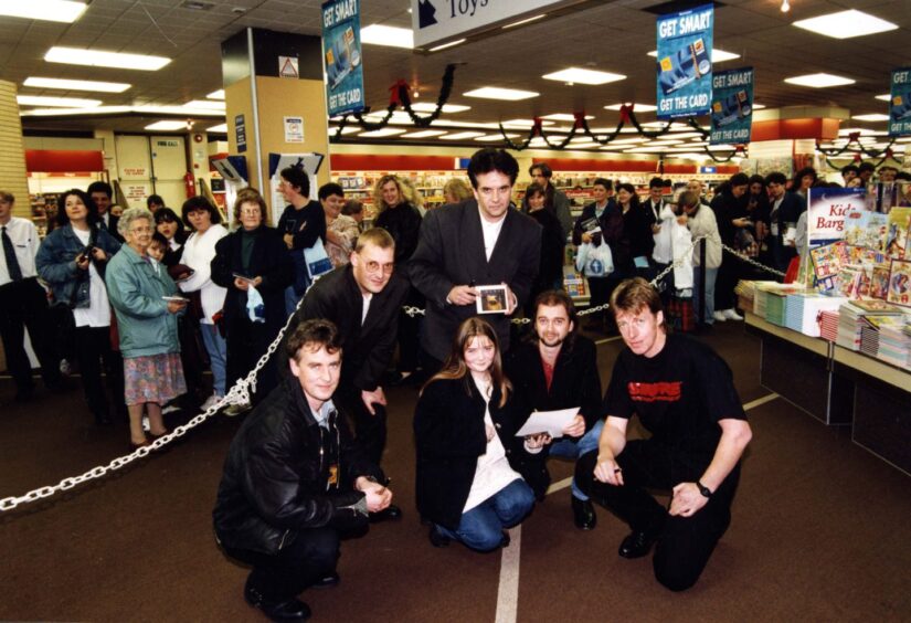 Runrig appeared at John Menzies in 1995 to sign copies of their new album