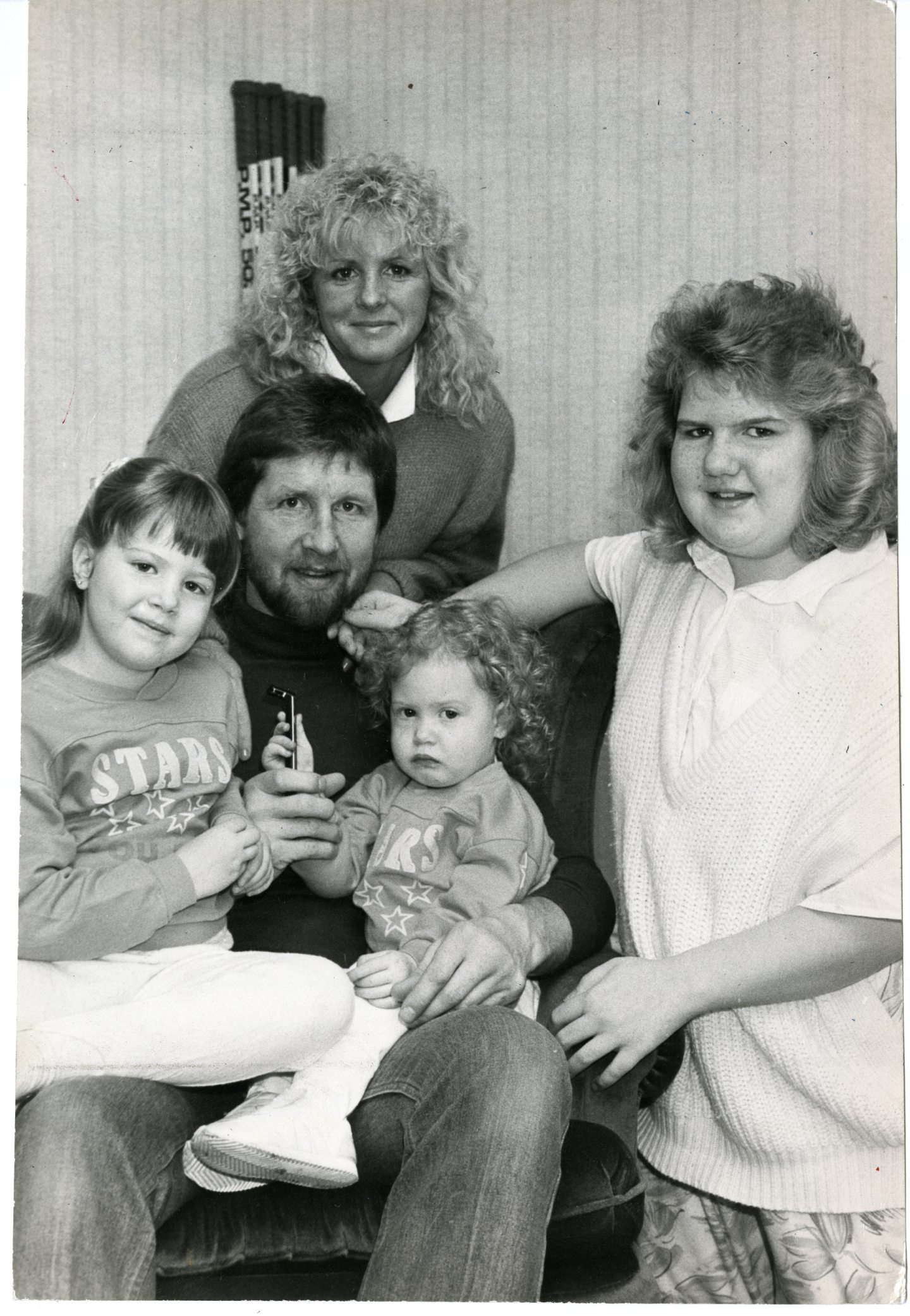 Unger at home with wife Bev and children Jamie, Kirsten and Kimberley. Image: DC Thomson.