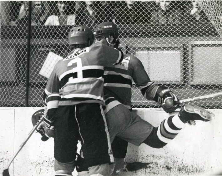 Unger gets in between Racers' Jim Lynch and Paul Hand in a game from 1985. Image: DC Thomson.