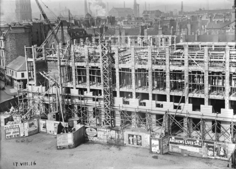 The Caird Hall, pictured being built, with scaffolding in place, was constructed following a ceremony at Ashton Works in 1914. Image: Dundee Libraries.