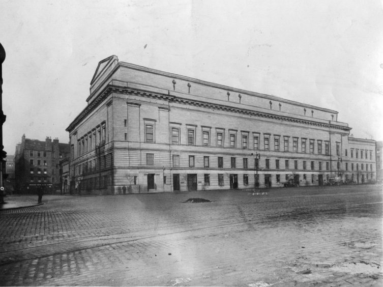 An exterior shot of the building in black and white. The Caird Hall has been at the heart of Dundee city centre since 1923. Image: DC Thomson.