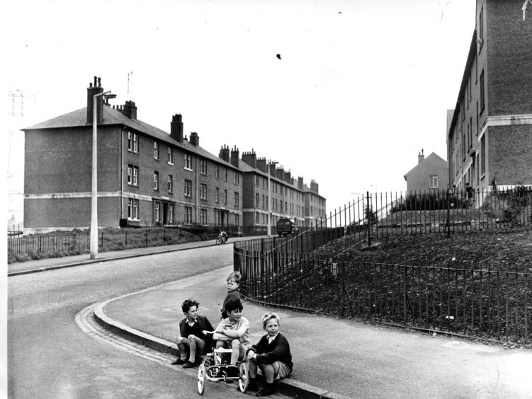 Children playing in the street in Mid Craigie in 1963. Image: DC Thomson.
