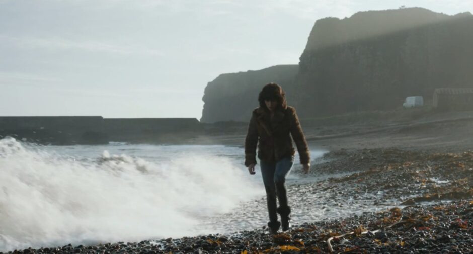 A scene showing Scarlett Johansson on the beach in the Under The Skin trailer at Auchmithie. Image: Supplied.