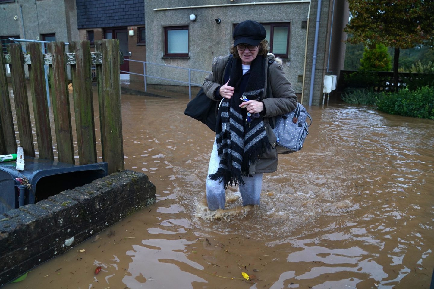 A woman in Brechin makes her way through the floods.