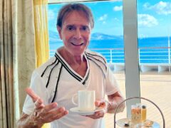 The veteran musician appears in front of a spectacular sea view in September’s shot (Robin Williams/Danilo Promotions/Cliff Richard 2023/PA)