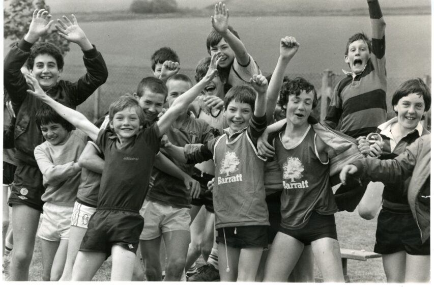 Pupils smile for the camera at sports day at the school in June 1983. Image: DC Thomson.