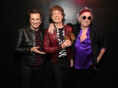The Rolling Stones pose with their Official Number 1 Album Award to celebrate their Official Number 1 album with Hackney Diamonds (Kevin Mazur/Official Charts Company/PA)