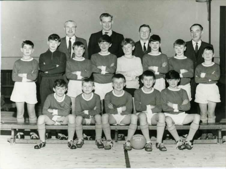 Johnstone (third from right, back row) pictured with the Dundee Primary Schoolboys team of 1965. Image: Supplied.