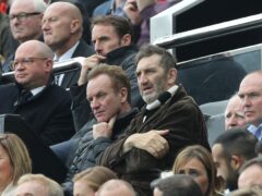 Jimmy Nail watching Newcastle United with Sting in 2017. Nail has spoken about the acting industry on the anniversary of the launch of Auf Wiedersehen, Pet (Owen Humphreys/PA)