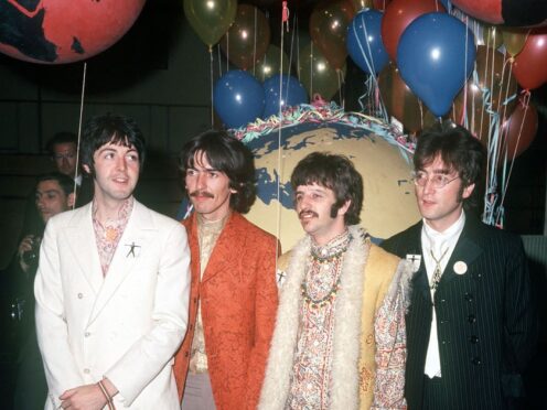 Paul McCartney, George Harrison, Ringo Starr and John Lennon, at a recording studio in London (PA)