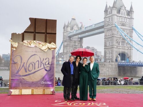 Hugh Grant, Timothee Chalamet, Olivia Colman and Rowan Atkinson during a photo call with the cast of Wonka at Potter’s Field Park, London (Ian West/PA)