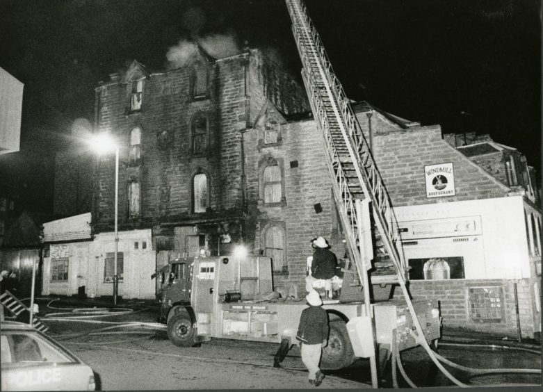Firefighters battle the blaze next to theWindmill Bar in November 1988. Image: DC Thomson.