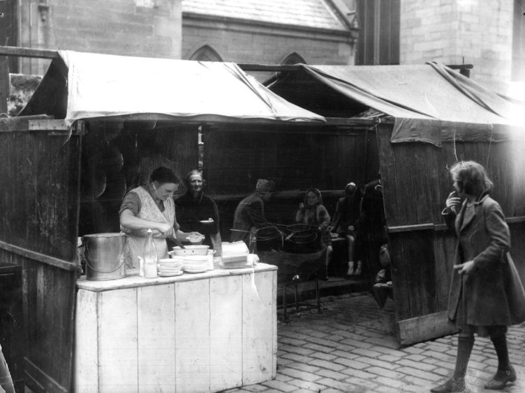 The buster stall at Mid Kirk Style in the Overgate in August 1949. Image: DC Thomson.