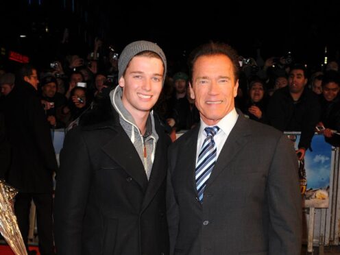 Patrick Schwarzenegger and his father Arnold (Ian West/PA)