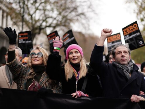 Tracy-Ann Oberman (left) and Rachel Riley (centre) take part in a march against antisemitism organised by the volunteer-led charity Campaign Against Antisemitism at the Royal Courts of Justice in London in November (Jordan Pettitt/PA)