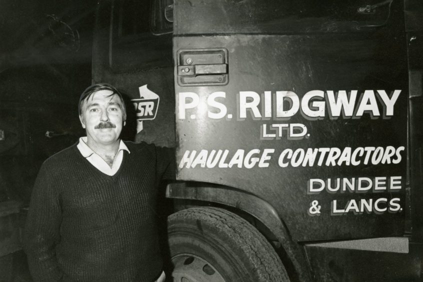 Keith Osgood beside his lorry