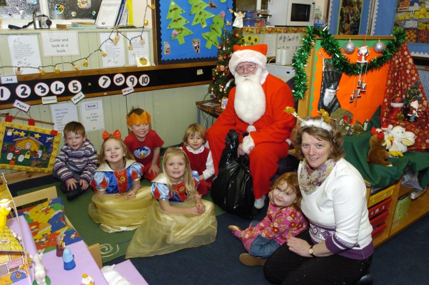 The children of Arbirlot Nursery with Santa at their Christmas party in 2005.