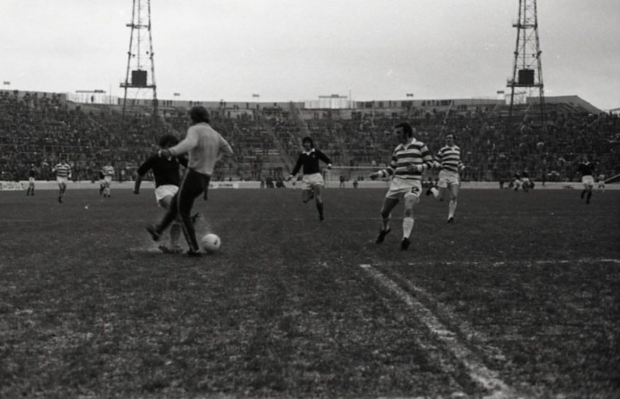 The Dundee and Celtic players were splashing about in puddles during the 1973 final. Image: DC Thomson.